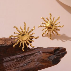 chapa maxista dorada de sol con rayos ondulados