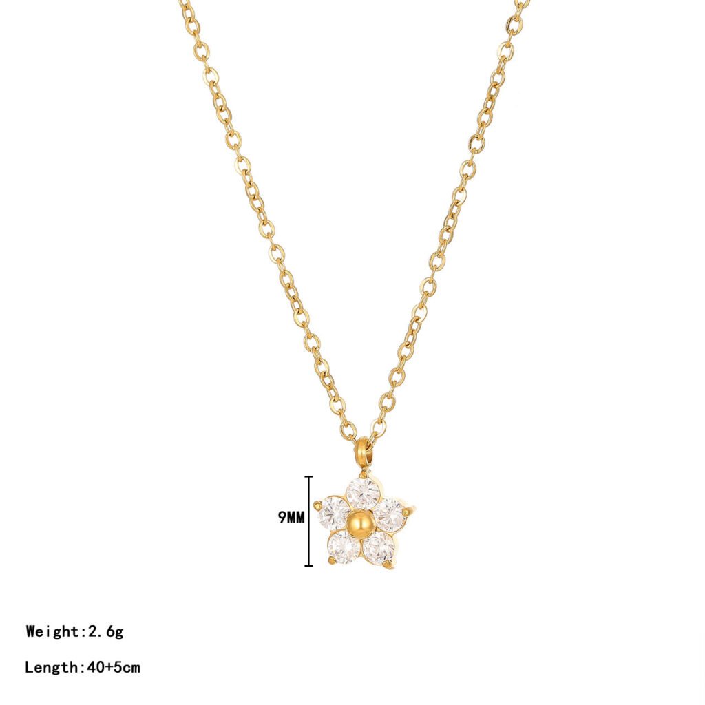 Cadena dorada minimalista con dige de estrella con circonias y con centro dorado cadena dorada minimalista con dige de estrella con circonias y con centro dorado